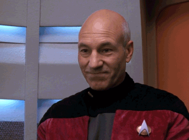 Gif of Picard smiling at three children