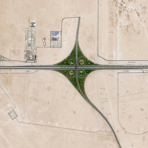 dailyoverview - A cloverleaf interchange is constructed on the...