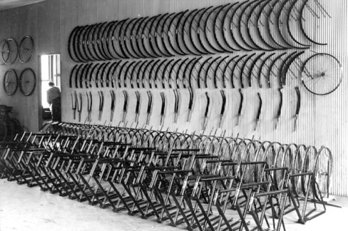 semioticapocalypse - Lewis Cycle Works. Bicycles await assembly,...