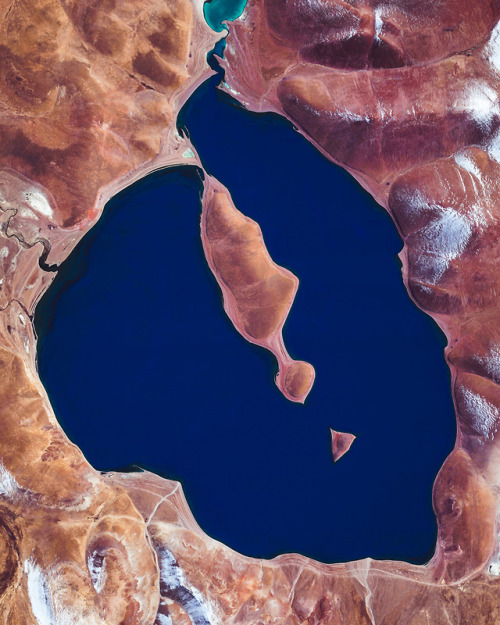 dailyoverview - The ultramarine waters of Lake Cuowomo add color...