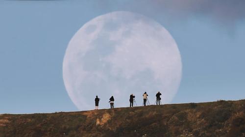 just–space - Photographers photographing the super moon in...