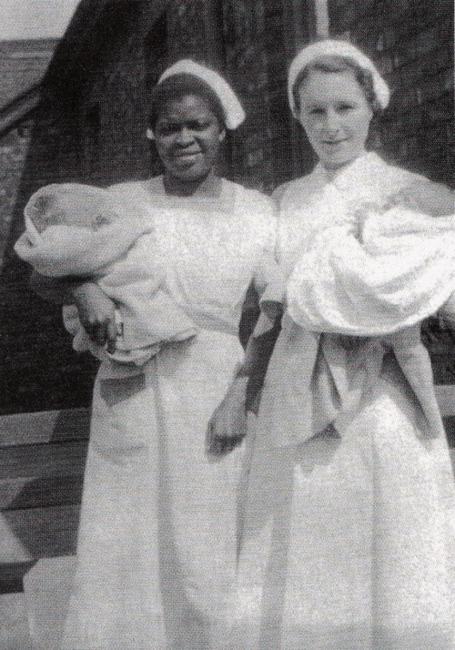 Mary Mohin: A lovely photograph. My mum- the one on the right- outside Walton Hospital, where she was a nurse and where Paul and I were born. Being the first son, he got a private ward, but I didn’t.
this was taken before the war and before Mum...