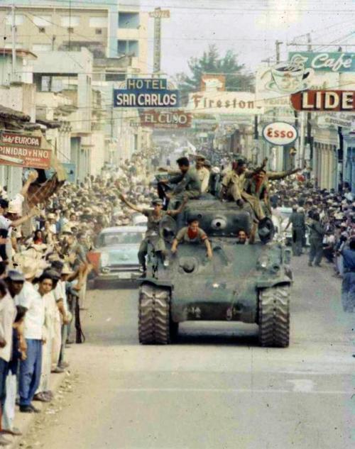 historicaltimes - Cuban revolutionaries parade in captured...