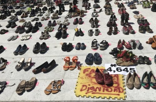 absolutelyiris:Citizens in Puerto Rico laid shoes at the San...