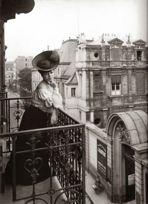historicaltimes:Lady on a balcony in Paris, 1900s - via...