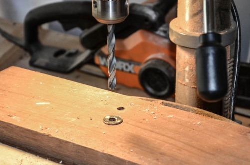 f-l-e-u-r-d-e-l-y-s - Designer Drills Holes into Quarters, Turns...