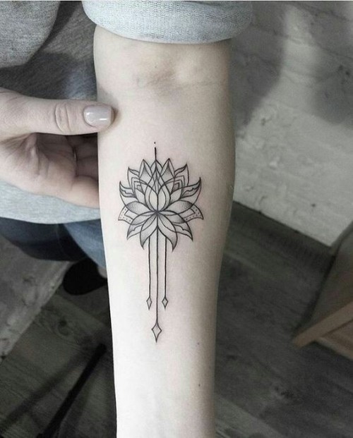 Delicate flower tattoo