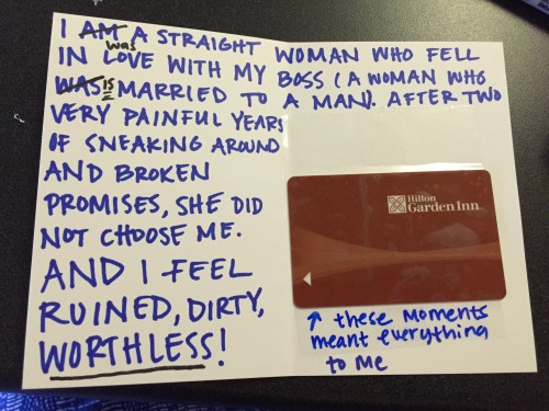 a folded piece of paper which reads - I am was a straight woman...