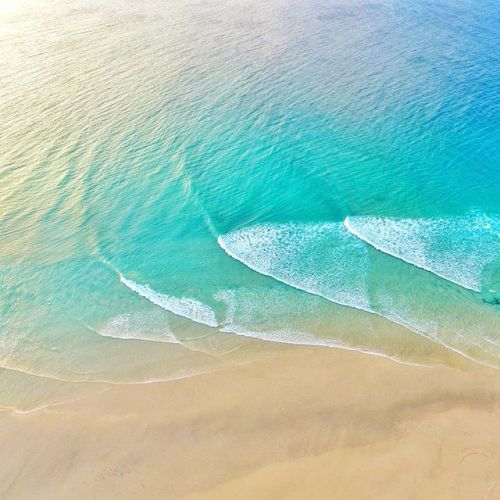 keiranlusk:Nature’s art. Sunset from high above the beach at...