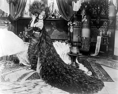 wehadfacesthen - Theda Bara wearing a gown of peacock feathers...