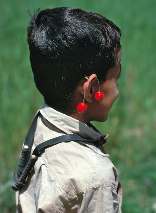 imransuleiman - A young boy carries his slingshot around his...