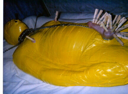 thetomblur - yellow tape mummified men-caged