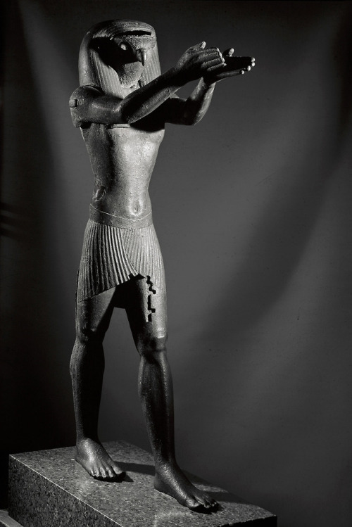 grandegyptianmuseum - Statue of the god Horus making a...
