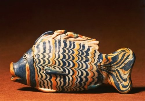grandegyptianmuseum - Polychrome glass vessel in the form of a...