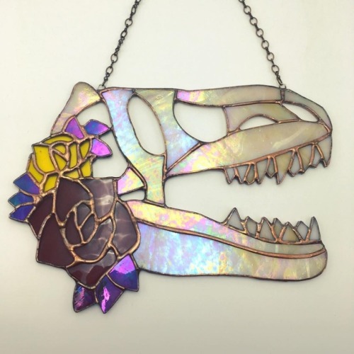sosuperawesome:Stained Glass Dinosaur and Unicorn Skulls, by...