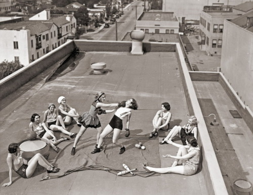 boycott-me - c-ornsilk - Women boxing on a roof, circa...
