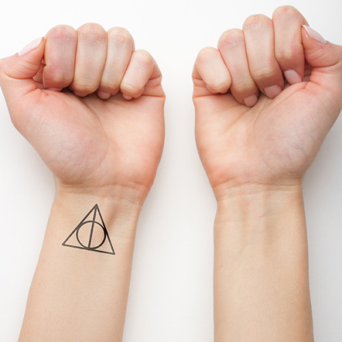 Harry Potter’s Deathly Hallows temporary tattoo on the left...
