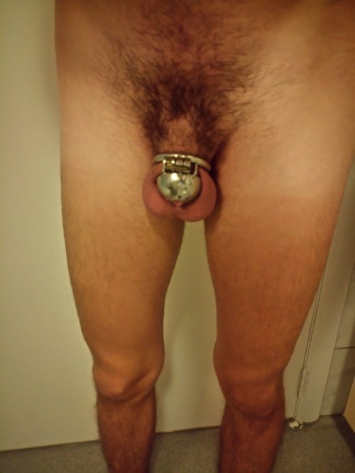 chastitypissslut:Locked in my smallest cage. Day 1 of...