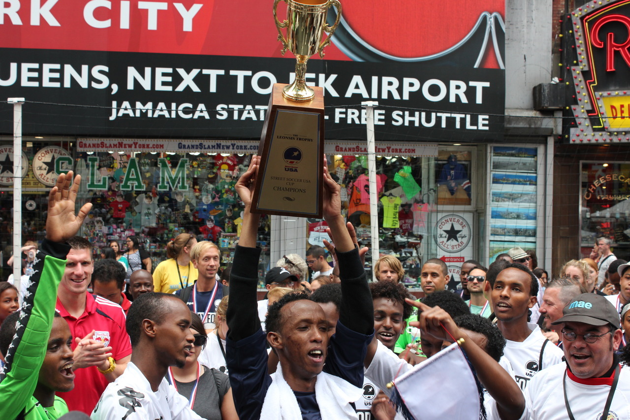 Showcasing the power to overcome homelessness in Times Square? The beauty of Street Soccer USA The mission is as simple as it is admirable: “scoring goals on the field, and achieving their goals in life.” The non-profit organization Street Soccer USA...