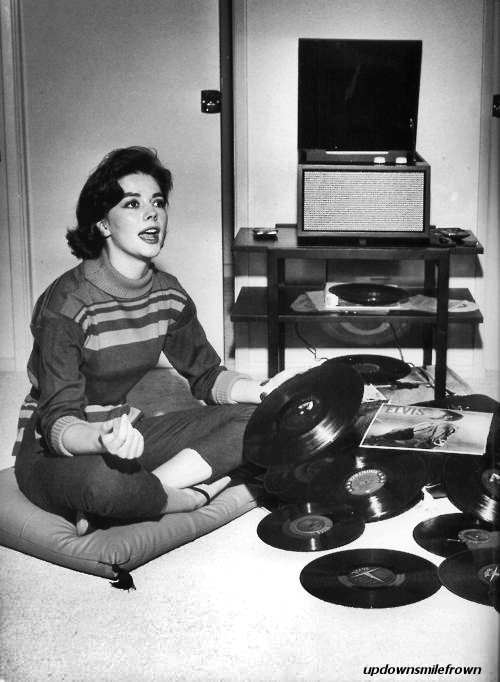 Natalie Wood with her Elvis records, by Murray Garrett