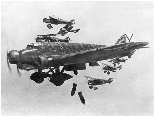 greasegunburgers - Italian Bombers in attack formation during...